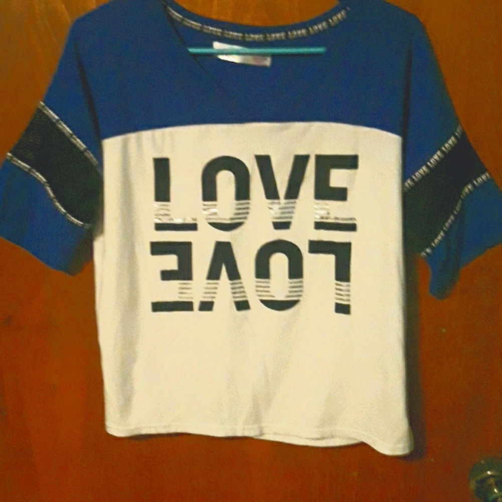 A Juniors Cute Top says Love.